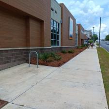 Transforming-the-Exterior-of-this-Aldi-with-a-Touch-of-Pine-Straw-in-Tallahassee-FL 1